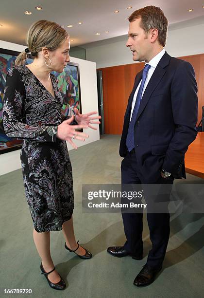 German Family Minister Kristina Schroeder and German Health Minister Daniel Bahr arrive for the weekly German federal government Cabinet meeting on...