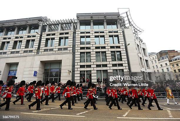 An Military band march past during the Ceremonial funeral of former British Prime Minister Baroness Thatcher on Fleet Street on April 17, 2013 in...