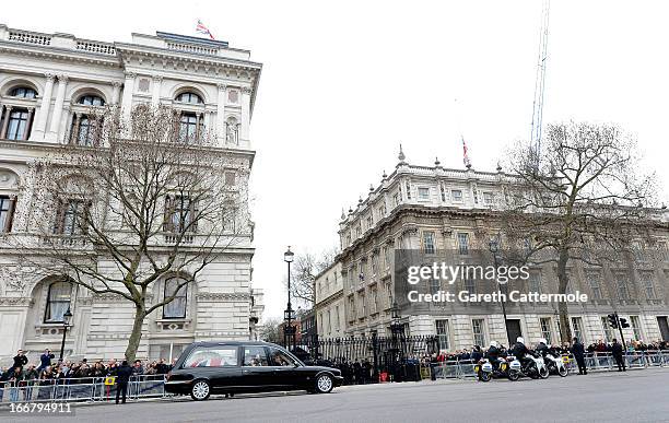 The hearse makes its way past Downing Street during the Ceremonial funeral of former British Prime Minister Baroness Thatcher on April 17, 2013 in...