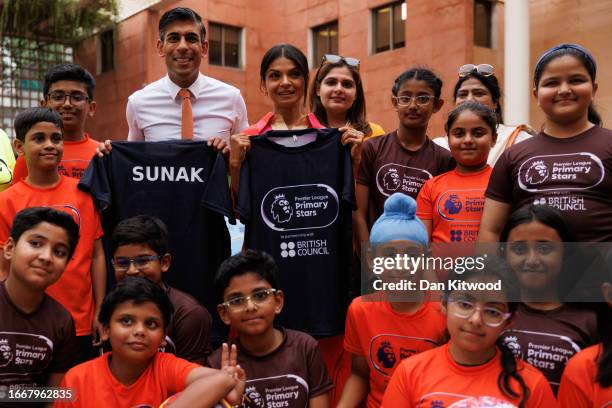 Prime Minister Rishi Sunak and his wife Akshata Murty meet local schoolchildren at the British Council during an official visit ahead of the G20...