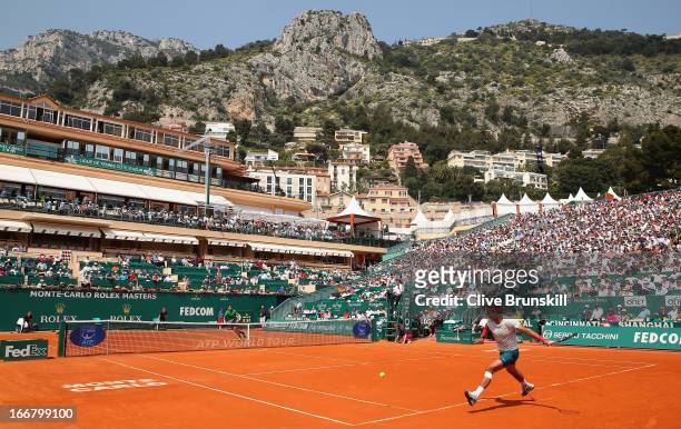 Rafael Nadal of Spain runs to play a forehand against Marinko Matosevic of Australia in their second round match during day four of the ATP Monte...