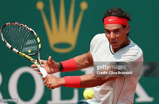 Rafael Nadal of Spain plays a backhand against Marinko Matosevic of Australia in their second round match during day four of the ATP Monte Carlo...