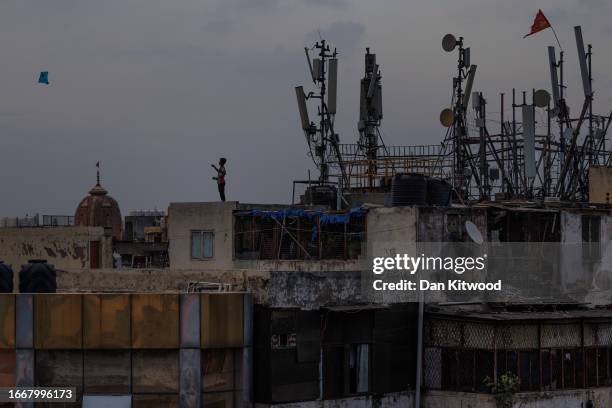 Kites are flown from roof tops at dusk in the Old Delhi district on September 08, 2023 in New Delhi, India. The Prime Ministers of the UK and India...