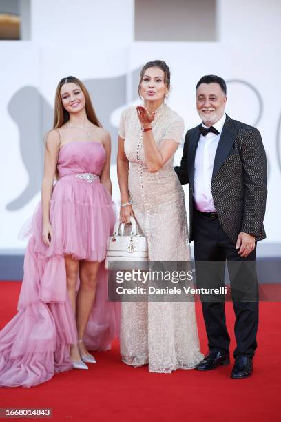 Jennifer Caroletti, Eva Henger and Massimiliano Caroletti attend a red carpet for the movie "Hors-Saison " at the 80th Venice International Film...