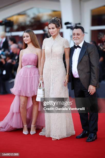 Jennifer Caroletti, Eva Henger and Massimiliano Caroletti attend a red carpet for the movie "Hors-Saison " at the 80th Venice International Film...