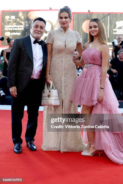 Massimiliano Caroletti, Eva Henger and Jennifer Caroletti attend a red carpet for the movie "Hors-Saison " at the 80th Venice International Film...