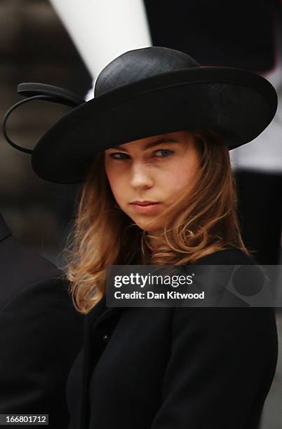 Amanda Thatcher, granddaughter of Baroness Thatcher looks on from the steps of St Paul's Cathedral as the coffin is placed in the hearse after the...