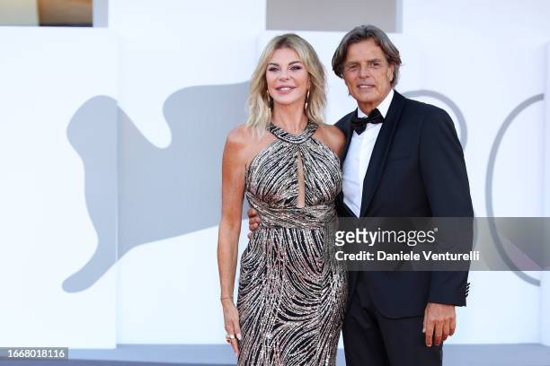 Alba Parietti and Fabio Adami attend a red carpet for the movie "Hors-Saison " at the 80th Venice International Film Festival on September 08, 2023...