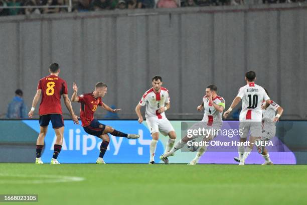 Dani Olmo of Spain scores the team's third goal during the UEFA EURO 2024 European qualifier match between Georgia and Spain at Boris Paichadze...