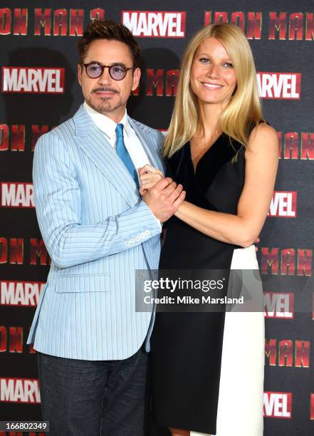 Robert Downey Jr and Gwyneth Paltrow attend the Iron Man 3 photocall at The Dorchester on April 17, 2013 in London, England.