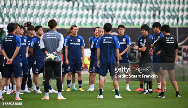 Players of Japan warm up during a training session at Volkswagen Arena on September 08, 2023 in Wolfsburg, Germany.