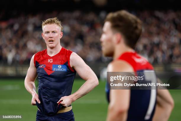 Clayton Oliver of the Demons looks dejected after a loss during the 2023 AFL First Semi Final match between the Melbourne Demons and the Carlton...