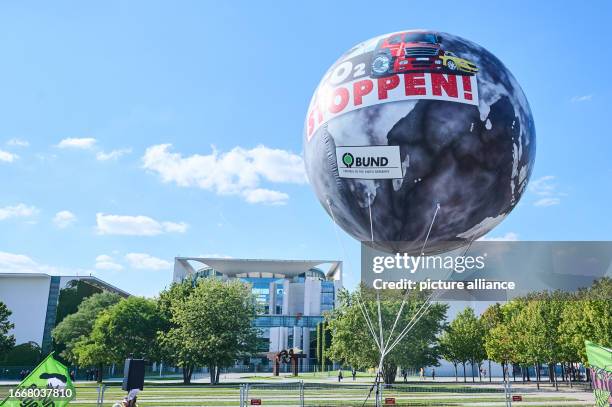 September 2023, Berlin: "Stop CO2!" is written on a balloon as thousands of children, young people and adults take part in the protest action of the...