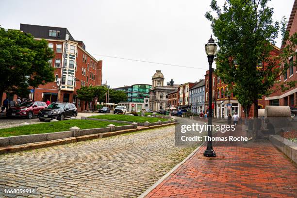 a cobblestone street in portland, maine - portland maine stock pictures, royalty-free photos & images