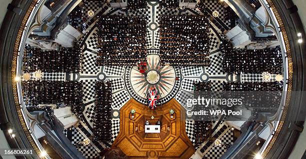 Pallbearers set down the coffin of Baroness Thatcher inside St Paul's Cathedral on April 17, 2013 in London, England. Dignitaries from around the...