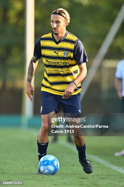 Gianluca Di Chiara of Parma Calcio runs with the ball during friendly match between Parma Calcio and Spal on September 08, 2023 in Collecchio, Italy.