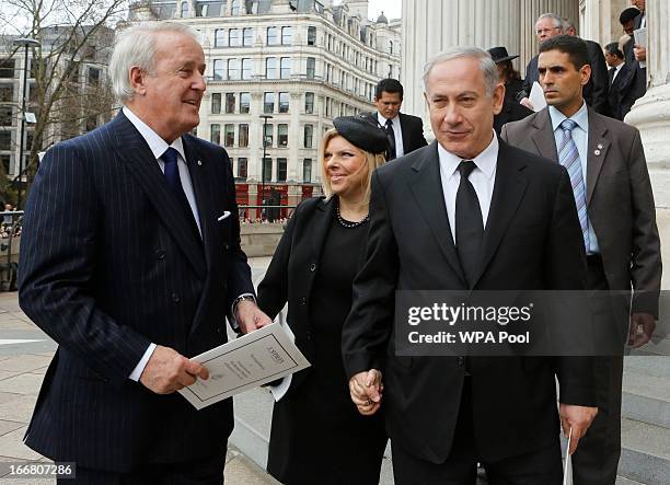 Former Canadian prime minister Brian Mulroney , and Israeli Prime Minister Binyamin Netanyahu leave after attending the funeral service of former...