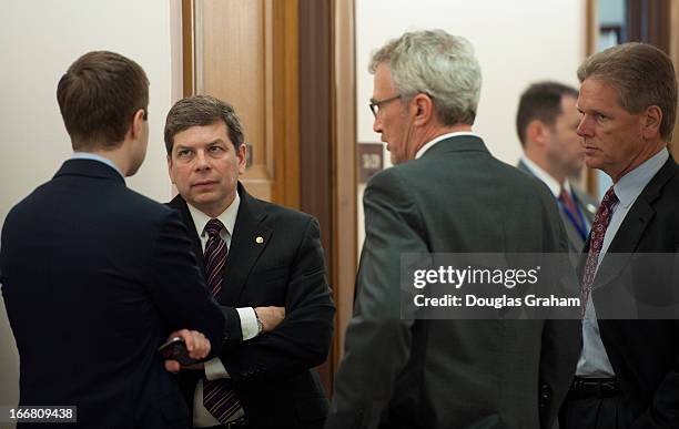April 17: Sen. Mark Begich, D-AK., talks with staff out side of the full committee hearing on the Homeland Security Department's budget submission...