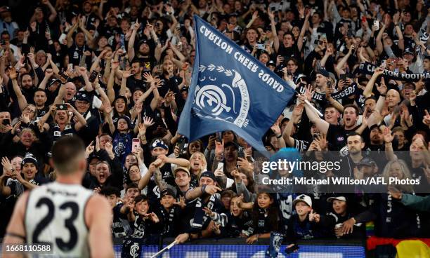 Blues fans celebrate during the 2023 AFL First Semi Final match between the Melbourne Demons and the Carlton Blues at Melbourne Cricket Ground on...