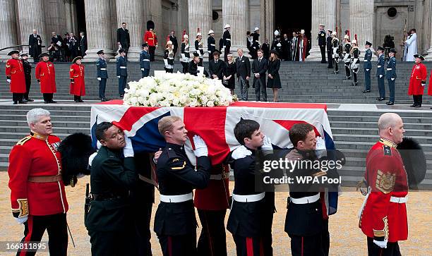 Carol Thatcher, Marco Grass, Sarah Thatcher, Mark Thatcher, Michael Thatcher and Amanda Thatcher watch as the coffin of former British Prime Minister...