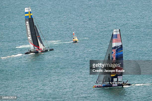 Team skippered by Roman Hagara and Team Artemis Racing skippered by Charlie Ekberg sail during a practice race of America's Cup World Naples Serieson...