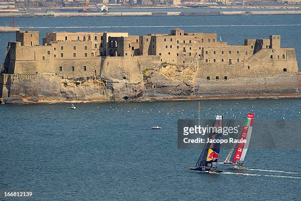 Team skippered by Roman Hagara and Team Luna Rossa Swordfish skippered by Francesco Bruni sail in front of Castel Dell'Ovo during a practice race of...