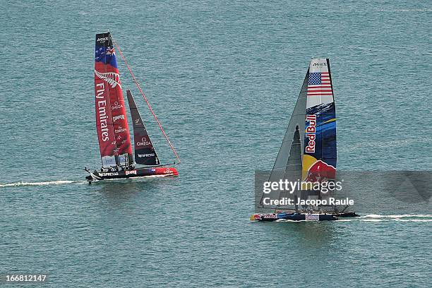 Emirates Team New Zealand skippered by Dean Barker and HS Team skippered by Roman Hagara sail during a practice race of America's Cup World Series...