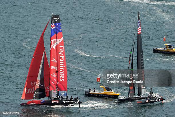 Emirates Team New Zealand skippered by Dean Barker and Team Oracle skippered by Tom Slingsby sail during a practice race of America's Cup World...