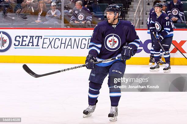 Aaron Gagnon of the Winnipeg Jets takes part in the pre-game warm up prior to NHL against the Florida Panthers at the MTS Centre on April 11, 2013 in...