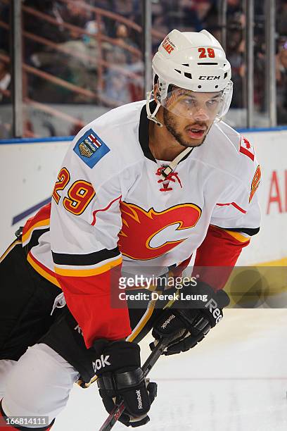 Akim Aliu of the Calgary Flames skates against the Edmonton Oilers during an NHL game at Rexall Place on April 13, 2013 in Edmonton, Alberta, Canada.