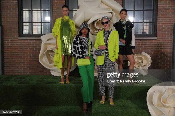 Models pose during the Kate Spade presentation on the Highline at 15th Street in New York City on September 08, 2023 in New York City.