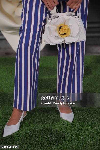 Model holds a purse detail shot during the Kate Spade presentation on the Highline at 15th Street in New York City on September 08, 2023 in New York...