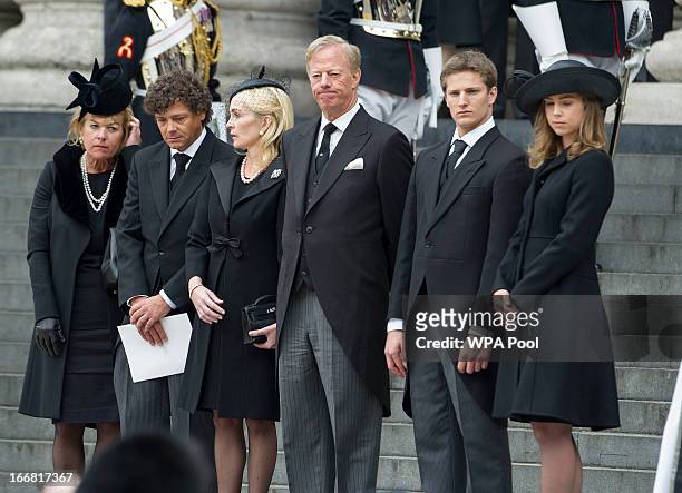 Carol Thatcher, Marco Grass, Sarah Thatcher, Sir Mark Thatcher, Michael Thatcher and Amanda Thatcher look on from the steps of St Paul's Cathedral on...