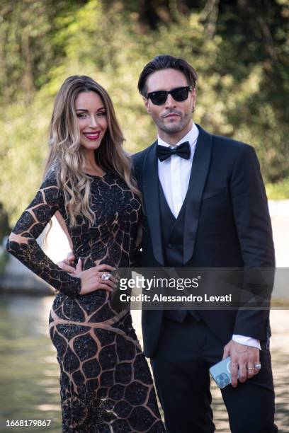 Delia Duran and Alex Belli are seen arriving at the 80th Venice International Film Festival 2023 on September 08, 2023 in Venice, Italy.