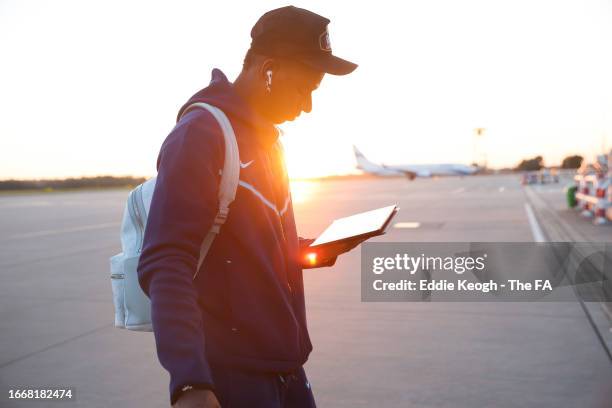 Marcus Rashford of England walks from the plane as the England squad arrive in Poland on September 08, 2023 in Wroclaw, Poland.