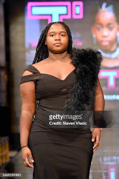 Model walks the runway wearing designer Tailor Made by Tae, during the NYFW hiTechMODA Season 10 Production at Gotham Hall on September 08 in New...