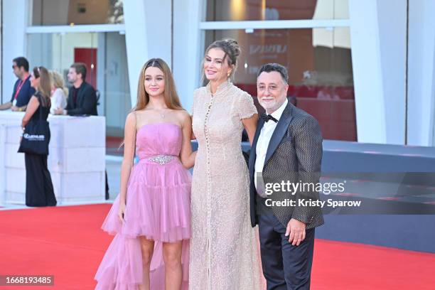 Jennifer Caroletti, Eva Henger and Massimiliano Caroletti attend a red carpet for the movie "Hors-Saison " at the 80th Venice International Film...