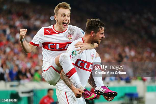 Martin Harnik of Stuttgart celebrates his team's second goal with team mate Alexandru Maxim during the DFB Cup Semi Final match between VfB Stuttgart...