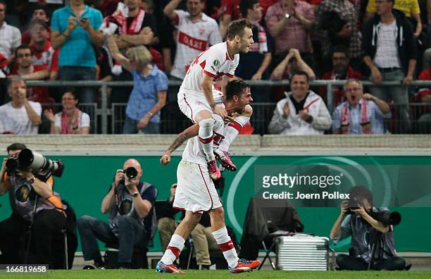 Martin Harnik of Stuttgart celebrates with his team mate Alexandru Maxim after scoring his team's second goal during the DFB Cup Semi Final match...