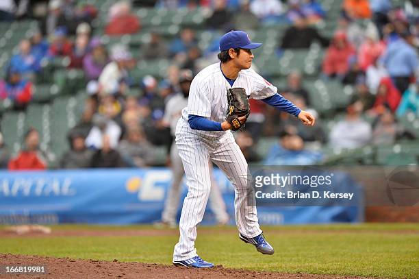 Relief pitcher Hisanori Takahashi of the Chicago Cubs delivers against the San Francisco Giants at Wrigley Field on April 11, 2013 in Chicago,...