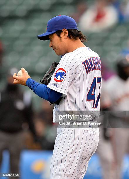 Relief pitcher Hisanori Takahashi of the Chicago Cubs stands on the field against the San Francisco Giants at Wrigley Field on April 11, 2013 in...