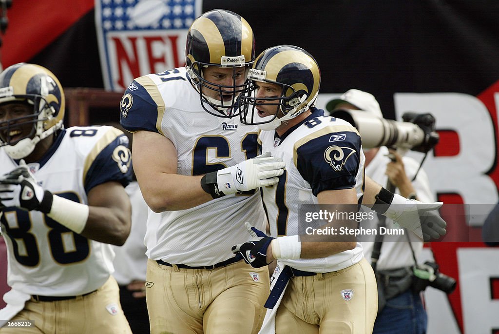 Ricky Proeh Ricky Proehl of the St. Louis Rams is congratulated by Tom Nutten ...