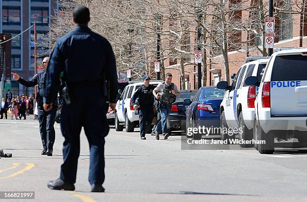 Homeland Security, U.S. Marshals, and the Boston Police Department evacuate the John Joseph Moakley United States Courthouse on April 17, 2013 in...