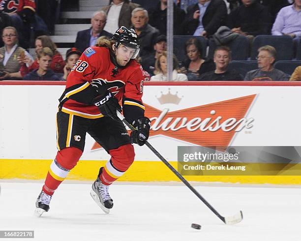 Ben Hanowski of the Calgary Flames skates against the Minnesota Wild during an NHL game at Scotiabank Saddledome on April 15, 2013 in Calgary,...