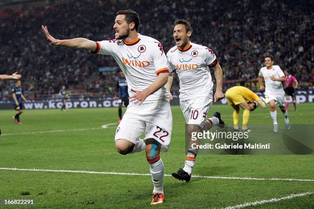 Mattia Destro of AS Roma celebrates after scoring a goal during the TIM Cup semifinal match between FC Internazionale Milano and AS Roma at Giuseppe...