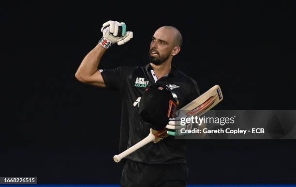 Daryl Mitchell of New Zealand celebrates reaching his century during the 1st Metro Bank One Day International between England and New Zealand at...