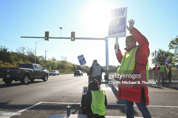 Workers with the UAW Local 2250 Union strike outside the General Motors Wentzville Assembly Plant on September 15, 2023 in Wentzville, Missouri. In...