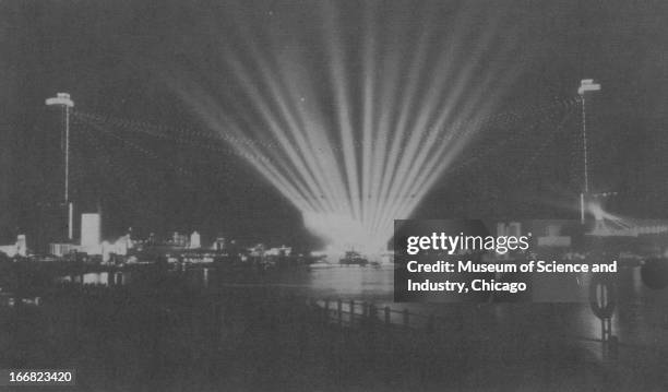 The Aurora of Light and Sky Ride Tower are clearly visible in a night view of the Chicago World's Fair grounds at the Century of Progress...
