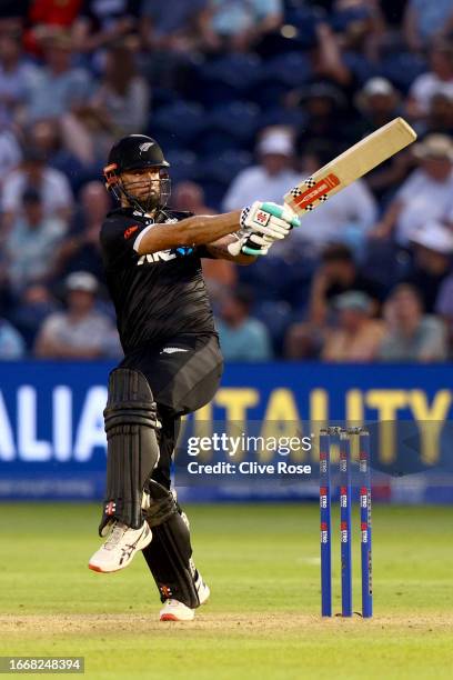 Daryl Mitchell of New Zealand hits out during the 1st Metro Bank One Day International between England and New Zealand at Sophia Gardens on September...