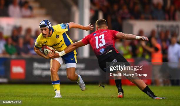 George Worboys of Bath Rugby looks to break past Matt McNab of Cornish Pirates during the Premiership Rugby Cup match between Cornish Pirates and...